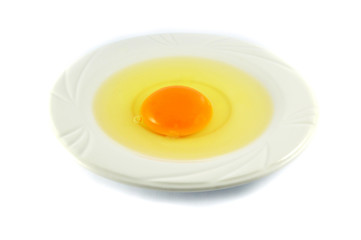 egg yolk isolated / fresh broken egg with yolk egg on white