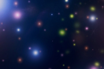 Fototapeta premium Abstract background from blurred colorful star in night sky.