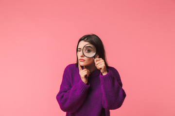 Pretty young girl wearing sweater standing isolated