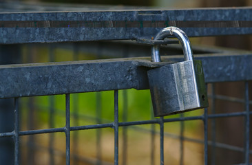 Silver padlock locking metal closure