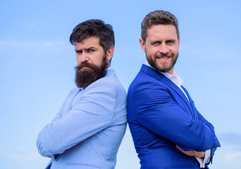 Bearded business people posing confidently. Perfect in every detail. Business men stand blue sky...