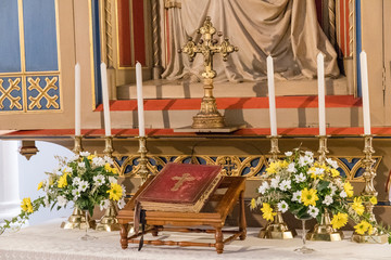 Fototapeta na wymiar The Bible on the altar in the church.