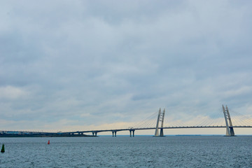 bridge over the river in cloudy weather