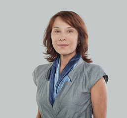 Mature businesswoman on white background, portrait
