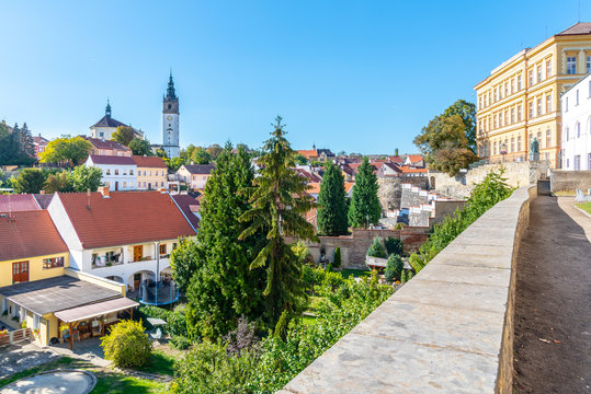 Litomerice cityscape with baroque St. Stephen's Cathedral and bell tower, Litomerice, Czech Republic. View from fortification walls and baileys.