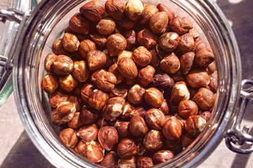 Peeled hazelnuts in the jar