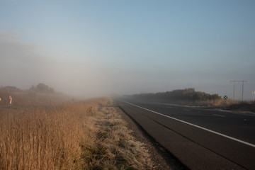 Misty road in the Australian country outback of New South Wales