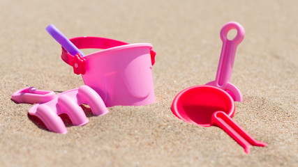 Fototapeta na wymiar Beach Toys Bucket Spade Girl