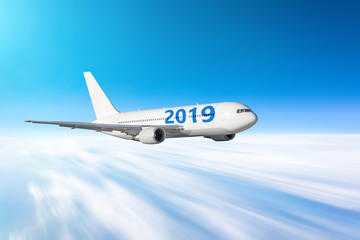 Naklejka na ściany i meble Airplane with the number 2019. The concept of the rapidly approaching future new year.