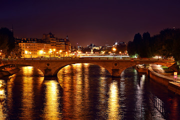 Fototapeta na wymiar The River Seine at night in Paris