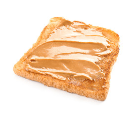 Toasted bread with peanut butter on white background