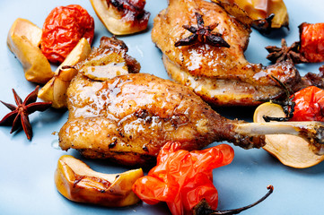 Duck legs with vegetable garnish