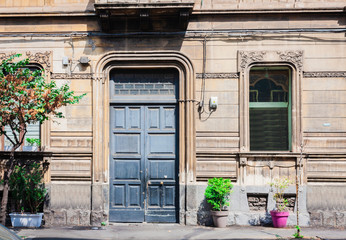 Fototapeta na wymiar Traditional architecture of Catania, Sicily, facade of ancient building