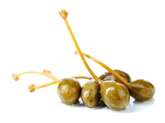 Pickled caper berries isolated on white background .