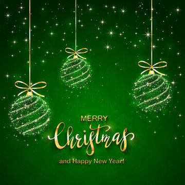 Shining Christmas balls and Text Merry Christmas on Green Background
