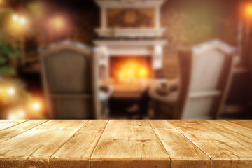 Fototapeta na wymiar Table background and fireplace 