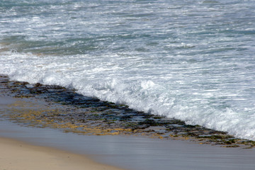 Waves landscape of a beach in North of Perth windy day lots of waves