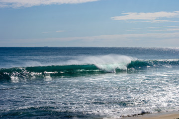 Waves at the beach in a windy day