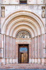 Fototapeta na wymiar View at the entrance to Baptistery of Parma in Italy