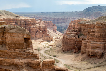 Charyn Canyon in Almaty region of Kazakhstan. Beautiful view of the canyon from the observation deck - 235885282