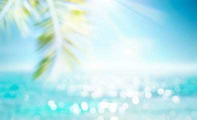 Abstract blur defocused background, toned gently blue, nature of tropical summer, rays of sun...