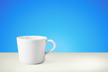 White mug on table