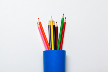 Fototapeta premium Wooden colorful ordinary pencils isolated on a white background