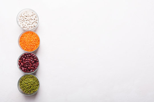 Lentils in glasses on the table. This legume contains a lot of vegetable protein