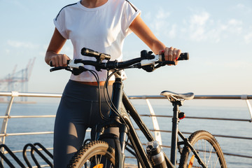 Fototapeta premium Cropped image of a young fitness girl