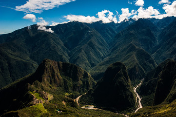 Fototapeta na wymiar Putucusi and Urubamba River as seen from Machu Picchu Mountain