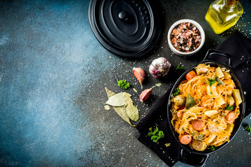 German, polish, Austrian cuisine dish, Bigos - sauerkraut cabbage stewed with meat, mushrooms and...