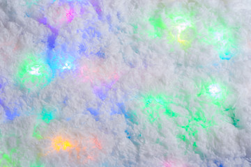 Fototapeta na wymiar Christmas abstract background with snow and a garland.
