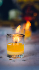 candle in glass