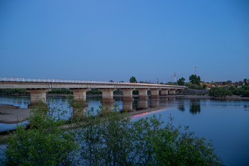 Naklejka premium long bridge over the river
