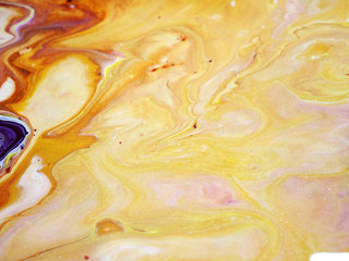 Abstract texture background fire painting. Yellow, cream and golden fluid acrylic.