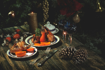 christmas still life with candle and decorations