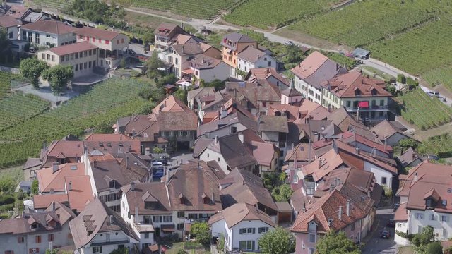 Aerial close-up on traditional Swiss village (Epesses) in Lavaux vineyard, Switzerland