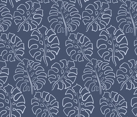 Beautiful seamless pattern with ropical jungle palm leaves.