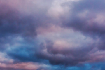 Fototapeta premium Colored cloudy sky background. The skies are lit up in the sun.