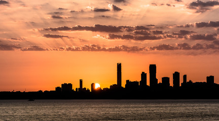 Fototapeta na wymiar Silhouette of skyline of Mumbai or Bombay during sunset