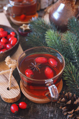 Healthy hot winter beverage. Rose hip tea and berries