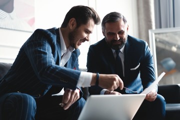 Business executives discussing work, developing strategy for online business, explaining sharing...