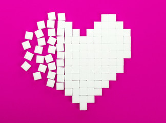Fototapeta premium Broken heart made of sugar cubes
