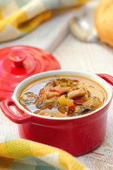 Homemade vegetarian mushroom soup with vegetables ready for dinner