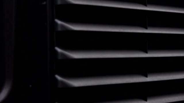 slow ped shot of a an SUV radiator grille