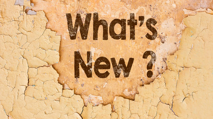 what's new ? question painted on old grunge wall