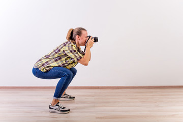 different photographer poses: bending, squatting, lying down