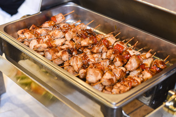 chicken shish kebab on a buffet table