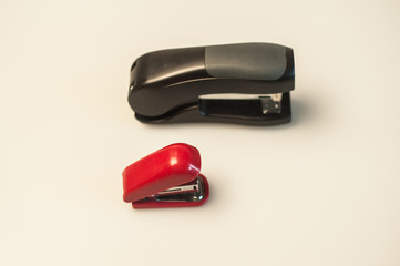 Black and red isolated staplers