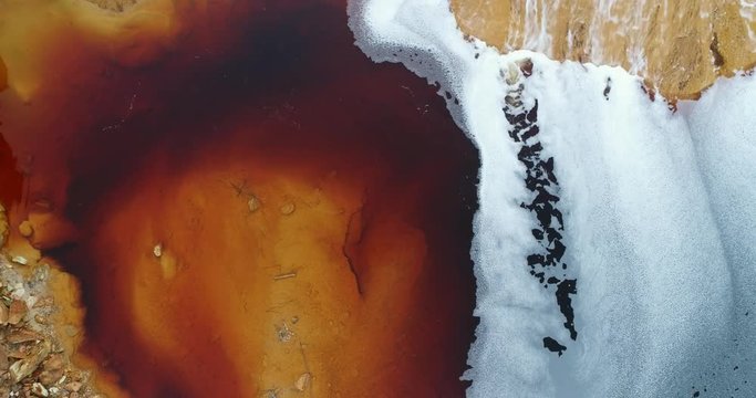 Rio Tinto river at Nerva besides the Rio Tinto mines. This river is very polluted and acid because of the extraction of tons of copper, zinc, gold, silver,lead and other metals since year 3000 BC to